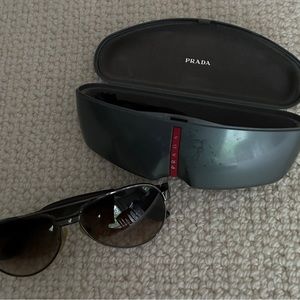 Prada men’s sunglasses.